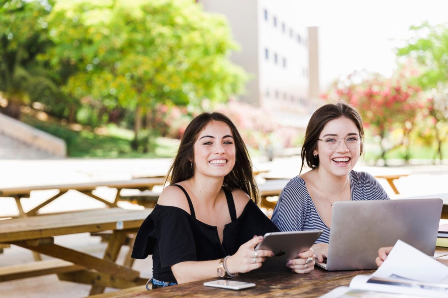 Person reviewing financial documents and planning budget
